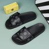 VilyVital black leather slide sandals with grey pattern displayed on flat surface